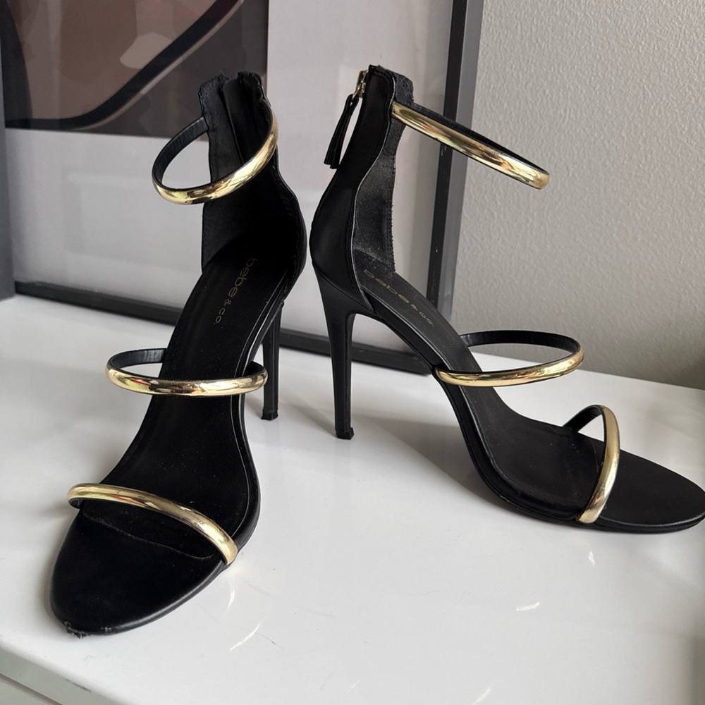 bebe Black and Gold Strappy Heels